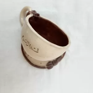 كوب حبوب القهوة