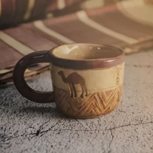 كوب الجمل والصحراء الليبية