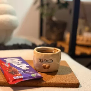 فنجان حبوب القهوة